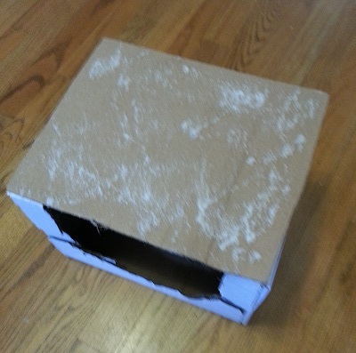 box surface with adhesive